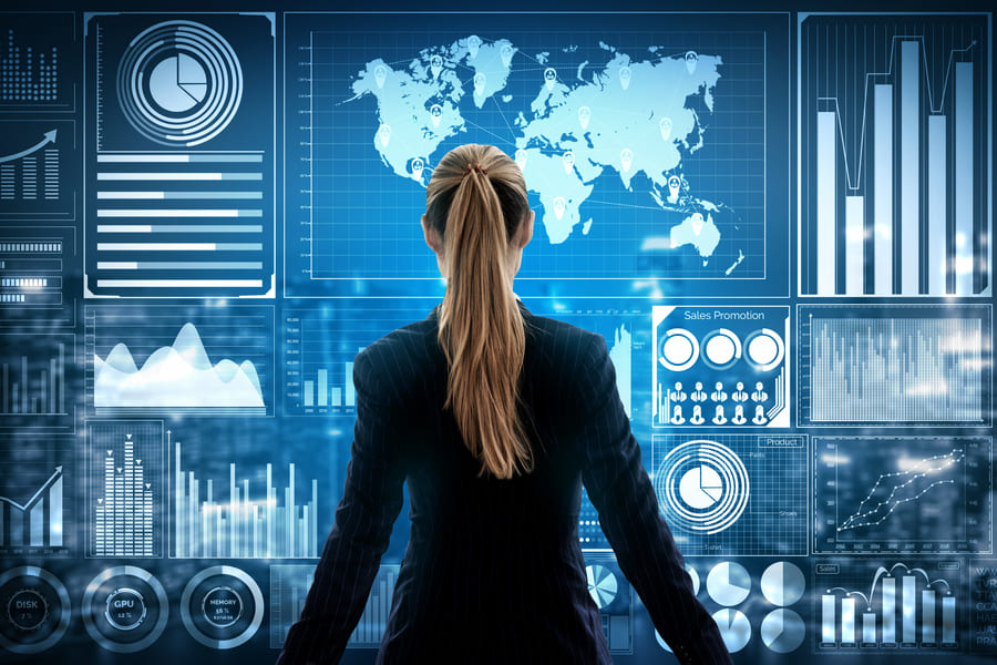 woman looking at world map