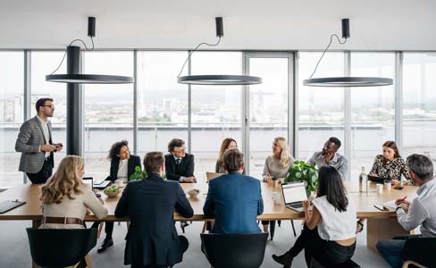 Business people around a meeting table